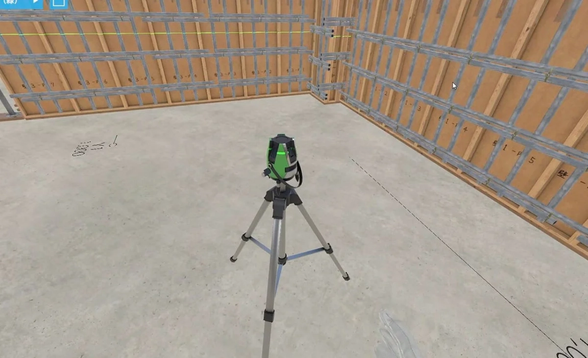 建設現場でレーザー墨出し器を使用する様子