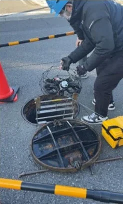 行田市内でのドローンを活用した下水道管路内点検の様子