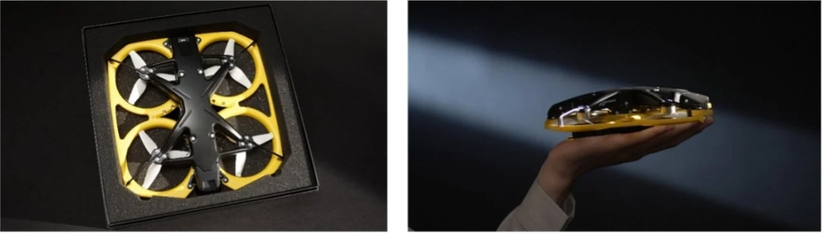 パッケージに収められた小型ドローンと手のひらのドローン