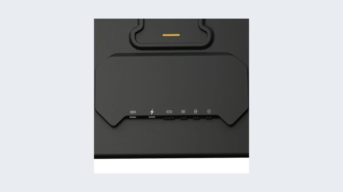 黒い電子機器のクローズアップ画像で、USB-C、充電、Wi-Fi、イーサネットなどの様々な接続ポートと機能を示すアイコンが配置されています。
